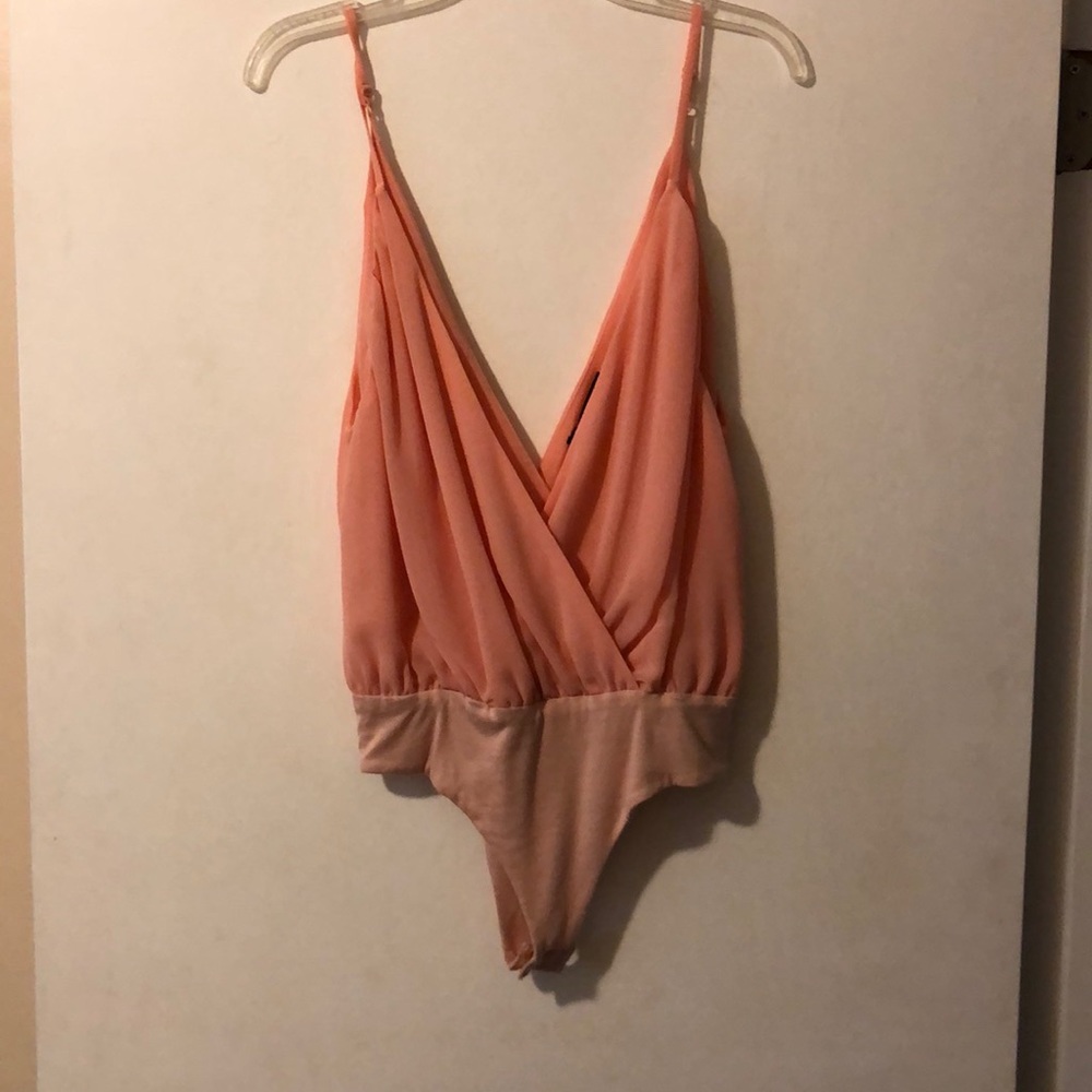 Foreign Exchange Bodysuit